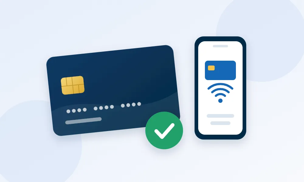 Illustration av ett kreditkort med en grön bock och en mobil med kortet inlagt för betalning